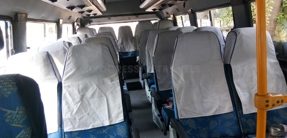 tempo traveller 26 seater interior