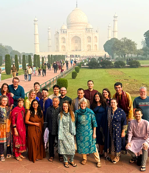 Happy tourist with map and backpack