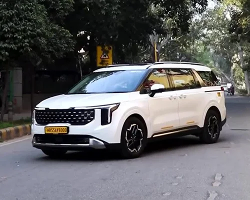 Kia Carnival on rent with driver in India